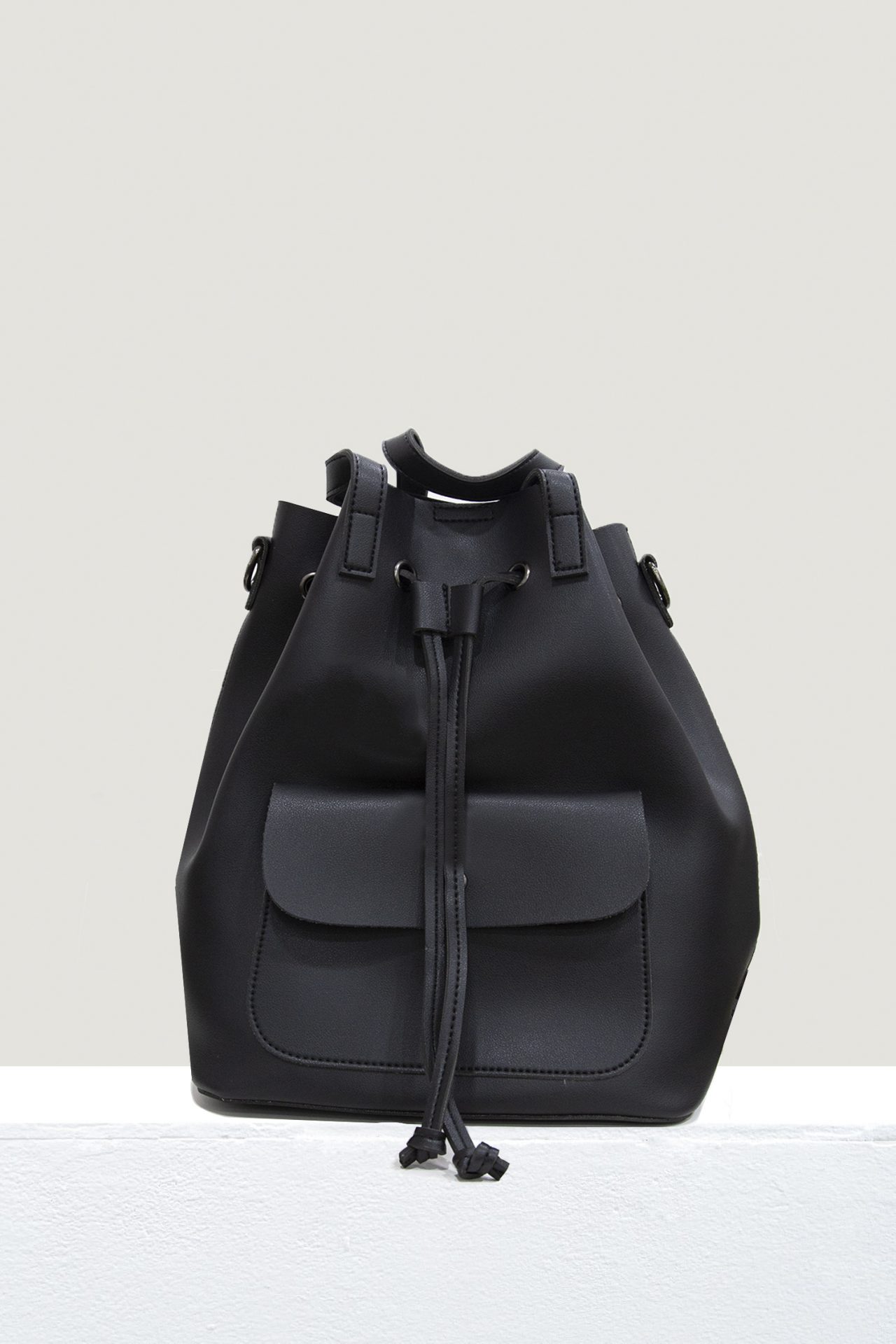 black drawstring bucket bag